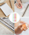 Heavy Duty Hole Punch Reinforcement Stickers Six Sheets For Loose Leaf Paper Fixes That Patch Broken Ring Bindings And Keep Your Class Notes Intact With No Sweat This Semester on a notebook with a pen.