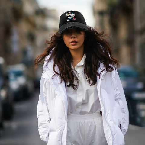 Stay Cool With This Breathable Yacht Style Hat For Men And Women Unisex Cap All Season Lightweight Moisture Wicking Adjustable Fit Perfect For Running Hiking Cycling And Everyday Outdoor Wear Go To Pick For Everyday Adventures worn by a woman in white jacket