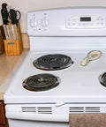 Two Pack 21 To 25 Inch Silicone Stove Gap Covers Flexible Food Grade Gap Filler For Kitchen Counter And Stovetop Semi Clear BPA Free Easy To Trim To Fit Keeps Crumbs And Spills From Falling Between Stove And Counter on white stove