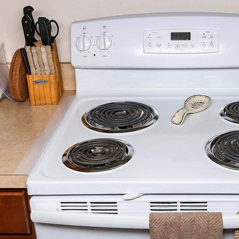 Two Pack 21 To 25 Inch Silicone Stove Gap Covers Flexible Food Grade Gap Filler For Kitchen Counter And Stovetop Semi Clear BPA Free Easy To Trim To Fit Keeps Crumbs And Spills From Falling Between Stove And Counter on white stove