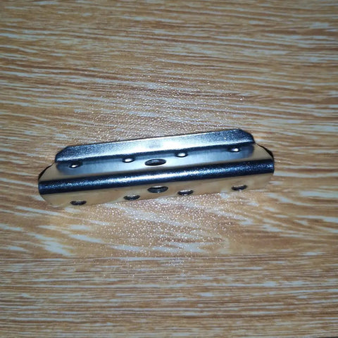 Must Have Pro Grade Webbing Clip Repair Kit For Upholstery Chairs And Sofas 50mm By 13mm Metal End Clip on wood surface