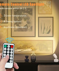 Dope 5W LED Indoor Spotlight Kit With Remote Dimmable And Timer 3 CCT Uplighting for artwork on wall; remote control visible