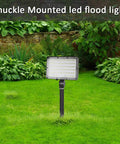Bright 150W LED Outdoor Flood Light With 21000 Lumens, 5000K Daylight, mounted on a knuckle in a garden setting