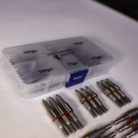 Archery Shatterproof Field Points Test Kit With 75 Grain, 100 Grain, 125 Grain, 150 Grain, And 175 Grain In A 15 Piece Set In A Sturdy Storage Box For Easy Practice, showing field points next to a labeled storage case.