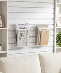 Two Pack Slatwall Magazine Display Pockets Clear Acrylic Literature Holders 8.5 W X 11 H X 2.5 D on wall with magazines and books