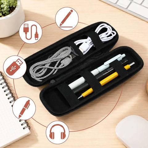 Heavy Duty EVA Hard Shell Pencil Case For Your Daily Grind Keeps Pens Styluses And Desk Gear Snug While You Ride Lightweight Protective Organizer opened with pens and cables inside.