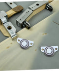 Heavy Duty 4 Pack Adjustable Sliding Door Roller Wheels Built Tough For Heavy Wooden Doors And Barn Hardware No Fuss Whisper Quiet Bearings Easy Closet Swap featuring two roller wheels on a wooden surface.