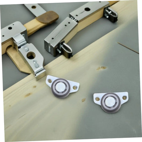Heavy Duty 4 Pack Adjustable Sliding Door Roller Wheels Built Tough For Heavy Wooden Doors And Barn Hardware No Fuss Whisper Quiet Bearings Easy Closet Swap featuring two roller wheels on a wooden surface.
