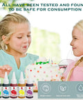 Two children with a cake, food color dye bottles in foreground with safety icons and text 'safe for consumption' above.