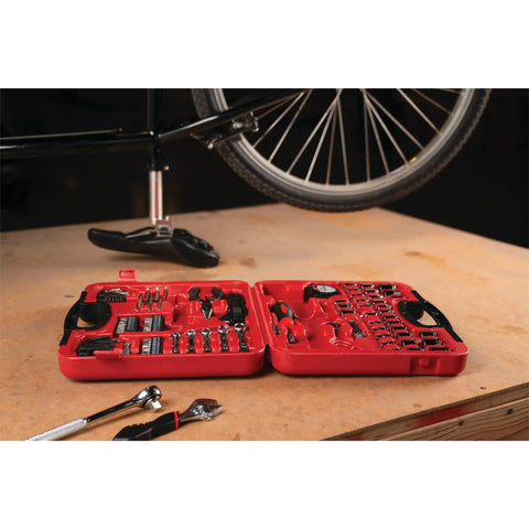 107 Piece Home And Auto Tool Set With Reversible 3/8 Inch Drive Ratchet, Pliers, Wrenches displayed in red case on a table
