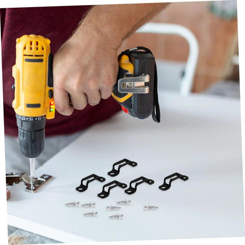 Hand holding a drill installing 30 Pack Heavy Duty Metal Furniture Connectors Rock Solid No Slack Hidden Assembly Hardware.