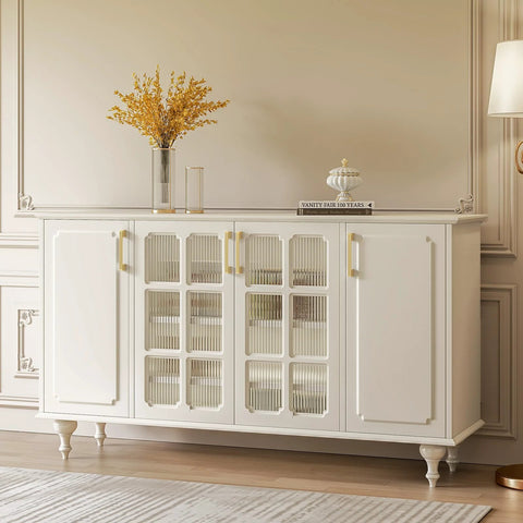 White cabinet with glass doors and gold cabinet pulls, featuring a brushed brass finish with safe rounded corners, in an elegant room.