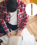 Man measuring wood with a ruler and pencil, inset of Double Headed Self Tapping Hanger Bolts Set 50 Pieces For Wood Joints