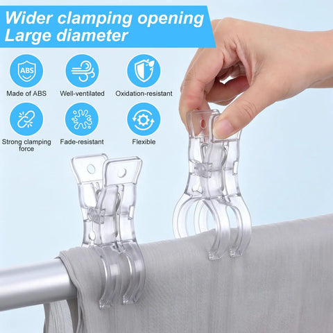 Hand using 30 Pack Balloon Arch Clamps For Backdrops, Large Clear Clips For Arch Stands to secure fabric on a pole.