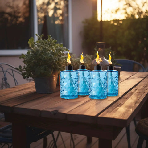 4 Pack Glass Table Top Torches With Wick And Cap, Multicolor Citronella Lanterns For Outdoor Yard Patio Deck Garden, Refillable Flame Light Torches on wooden table