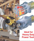 Man using saw with heavy duty outdoor extension cord 100 ft green with lighted connector 12/3 SJTW weatherproof