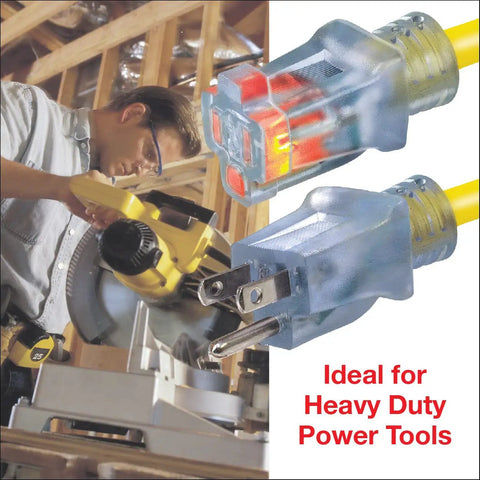 Man using saw with heavy duty outdoor extension cord 100 ft green with lighted connector 12/3 SJTW weatherproof