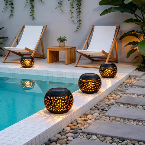 Outdoor Solar Lanterns Waterproof For Porch Garden Patio Vintage Leaf Pattern Metal Lanterns With Warm Flame Light next to pool