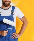Man holding a Mini Paint Roller Sponge Head For Flawless Wall Edge Painting And Cabinet Touch Ups with white grip.