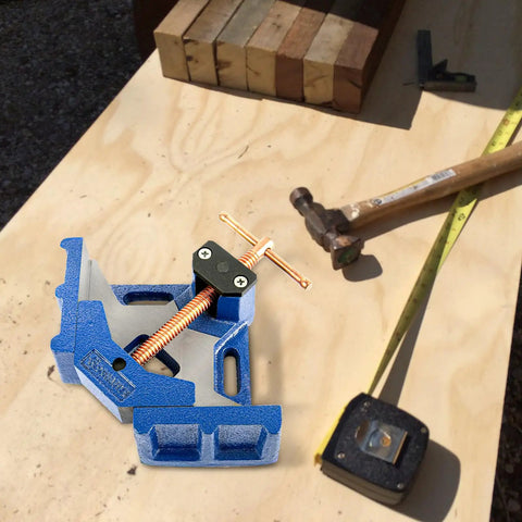 Rugged Ductile Iron 90 Degree Angle Clamp With 2.36 Inch Opening For Welding And Metal Fabrication, Powder Coated Rust Resistant Build, High Tensile Strength For Precise Grips And Durable Performance. blue ductile iron angle clamp on wood