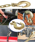 Four Pack Heavy Duty Forged Steel G70 Clevis Slip Hooks With Spring Loaded Safety Latch One Quarter Inch Tow Chain Grab Hooks attached to chains and equipment.