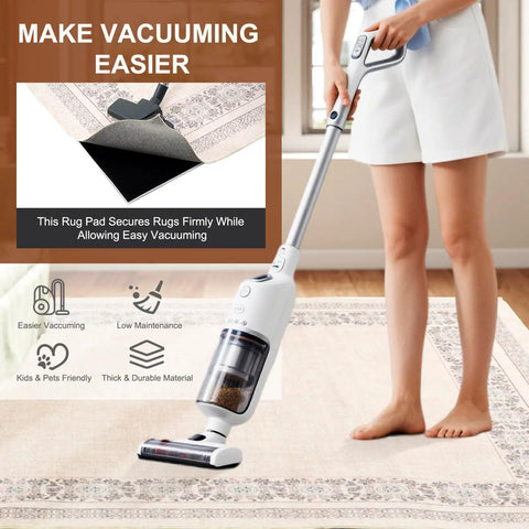 Person vacuuming a rug with Half Inch Thick Non Slip Rug Pad For 9 By 12 Ft Rugs Under Rug Mat With Cushioned Grip Carpet Protector.