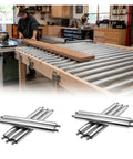Heavy Duty Stainless Steel Conveyor Roller With Spring Loaded Design For Smooth Material Handling And Heavy Load Capacity Upgrades On Gravity Systems, 50mm rollers in workshop.