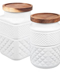 Level Up Your Kitchen Stash With These Sleek Frosted Glass Canisters Airtight Storage Jars a pair of 1800ml jars with wooden lids.