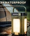 Portable IPX4 Waterproof Camping Lantern With 2000mAh Solar Charging in rain near a tent showcasing durability and design.