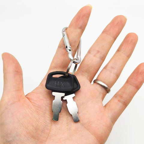 Hand holding generator key replacement and ignition switch for Honda GX series and clone engines 420cc 13HP with keychain
