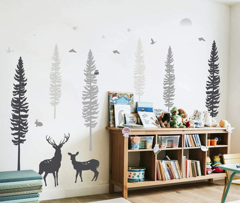 Dreamy Forest Woodland Nursery Wall Decals Set With Pine Trees Owls And Deer in playroom with books and toys