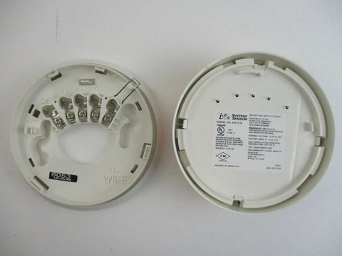 Base view of photoelectric smoke detector with thermal sensor, plug-in design, 12 24 VDC, integrated sounder and base.