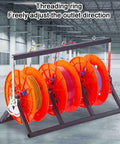 Rugged Metal Wire Dispenser Rack And Cord Reel Organizer for electricians in warehouse setting with orange spool reels