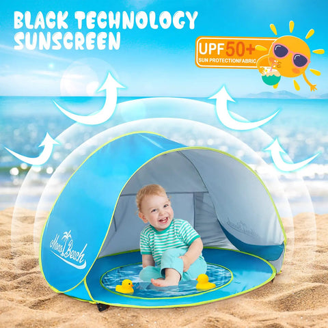 Pop Up Baby Beach Tent Shade Lounge With Auto Open Portable Sun Shelter For Infants Under Three UV 50 Plus Protection Pool And Sand Play Area Ideal For Family Beach Trips on sandy beach with child inside.