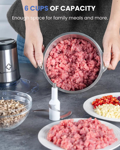 6 Cup Mini Food Processor Chopper With 250W Motor And Stainless Steel Blades Plus Meat Grinder Attachment For Meat Veggies Onion Garlic Nuts Sauces Ice And Baby Food In A Compact 1.5L Kitchen Processor showing processed meat and blade attachment.