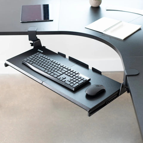 Rock Solid Slide Out Keyboard Tray For Corner Desk Effortless Gliding Computer Drawer With Swivel Clamps Black, shown mounted with keyboard and mouse.