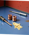 Retro Metal Duckbill Hasp Locks For Bags And Boxes With Secure Toggle Buckle Replacement Hardware on a workbench with tools.