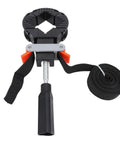 Kickass Picture Frame Clamp With Thirty Two Foot Nylon Strap And Quick Tension Woodworking Band For DIY Assembly Cabinet Making and Big Table Corner Jig, showing black clamp with nylon strap.