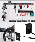Heavy Duty Slat Wall Hook Set 28 Piece Garage Storage Kit with Locking Hooks for Slatwall Panels in use with tools and bike