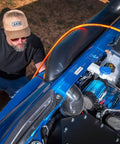 Premium Twin Motor 12V Brushless Air Compressor Built For Offroad Trucks shown installed with air hose for quick inflation.