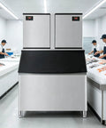 Heavy Duty Commercial Ice Maker Pumping Out Crisp Clear Cubes On The Fly With Stainless Steel Frame in a kitchen.