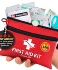 Red compact first aid kit pouch with 100 pieces for car and travel emergencies