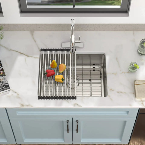 Overhead view of a 23 Inch Undermount Bar Sink Single Bowl 16 Gauge 304 Stainless Steel for kitchen RV wet bar prep with vegetables on rack.