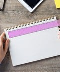 Person using Colorful 12 Inch Plastic Ruler Set Two Sided Imperial And Metric For School Office And DIY Projects on notebook