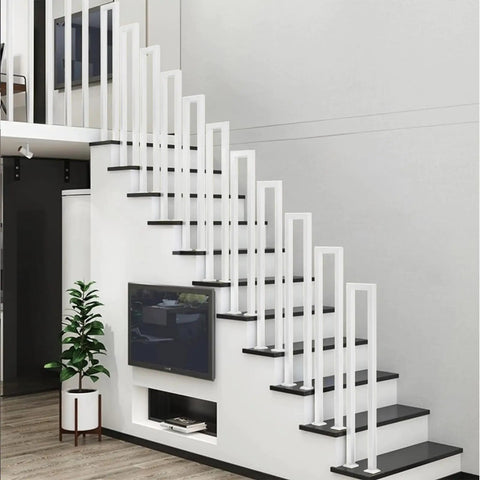 Heavy Duty Side Mount Stair Rail With Rock Solid Grip For Deck Balusters And Outdoor Steps Easy Peasy Install No Sweat Setup Built Tough As Nails Ideal Grip For Seniors And Kids All Weather Durable mounted on modern staircase with black steps.