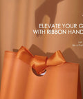 Close-up of gift bag with satin ribbon handle, part of Bulk 10 Pack Paper Gift Bags With Satin Ribbon Handles Assorted Colors.