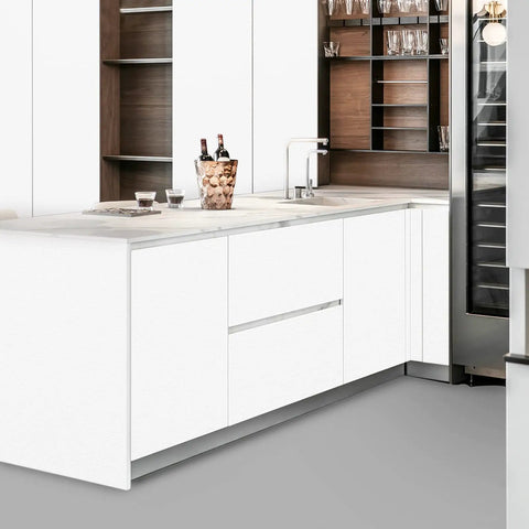 Kitchen with counter and cabinets covered in Thick White Matte Self Adhesive Contact Paper Size 16 Inch By 198 Inch Waterproof Peel And Stick Vinyl Film Wrap For Walls Furniture Countertops Cabinets And DIY Decor.