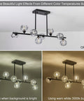 Modern Black Sputnik Chandelier With Crystal Ball Shade Dope 8 Light Industrial Globe Pendant Lighting For Kitchen Island And Dining Room Linear Hanging Fixture Anti Rust Metal Frame shown in different lighting conditions