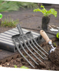 High-Performance Steel Soil Loosening Fork With Four-Tooth Design for deep soil aeration and easy mount handle, in garden