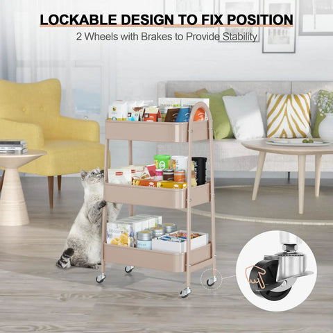 Three Tier Rolling Utility Cart With Lockable Wheels And Handy Metal Handle, Metal Storage Organizer On Wheels With Mesh Baskets For Kitchen, Living Room, Office Or Garage Beige Finish shown in a living room with a cat nearby.